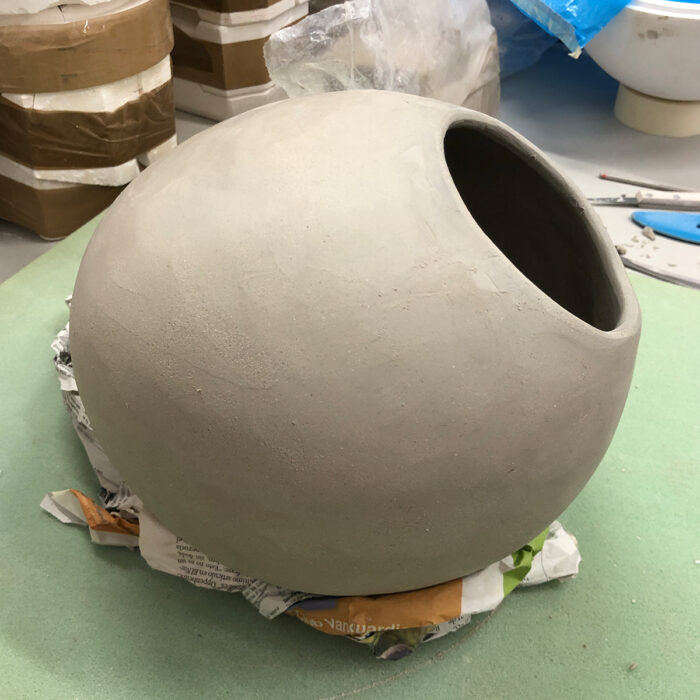 Handbuilding a sphere out of clay