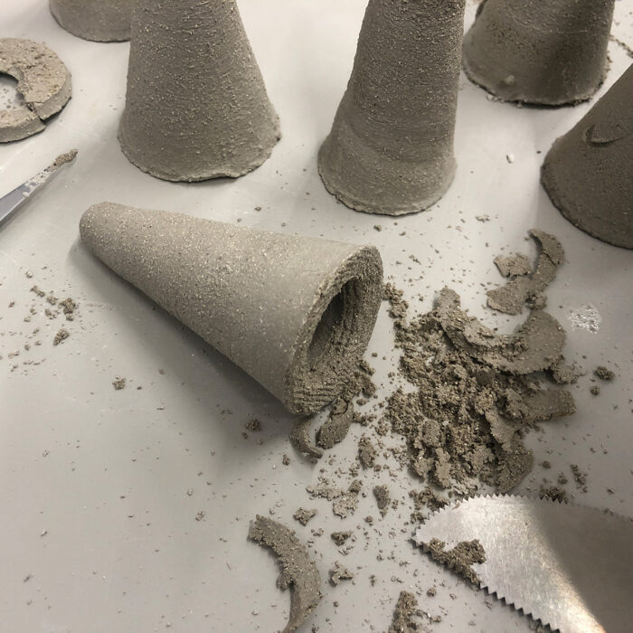 Shaping cones out of clay